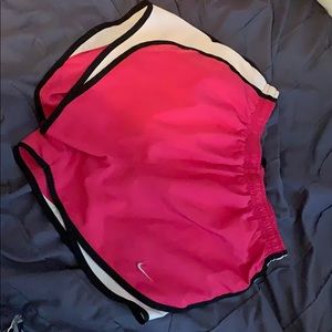 Pink Nike running shorts